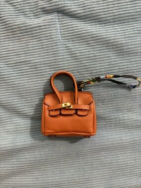 Compact Orange Top-Handle Mini Bag with Gold-Tone Accent